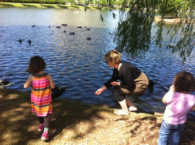 Larkin Grant in Big Spring Park (Huntsville, Alabama) feeding ducks