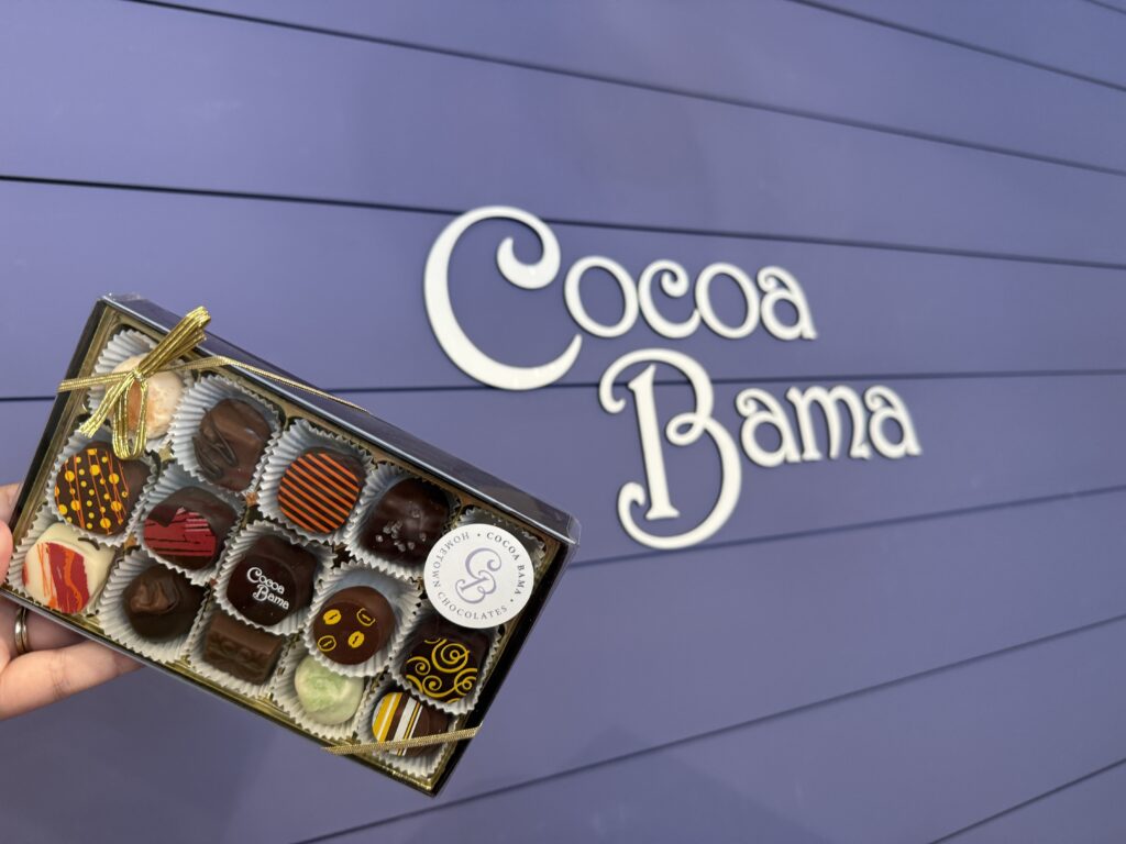 box of chocolates and cocoa bama sign