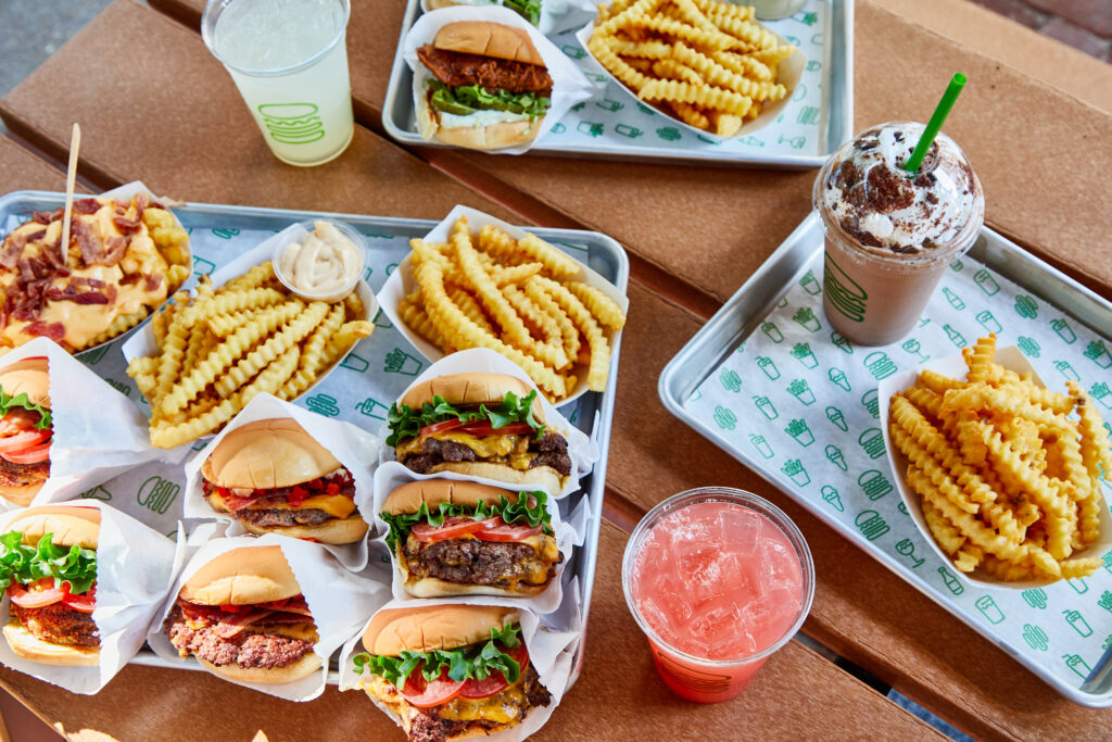 Food on a table from Shake Shake, burgers fries and shakes