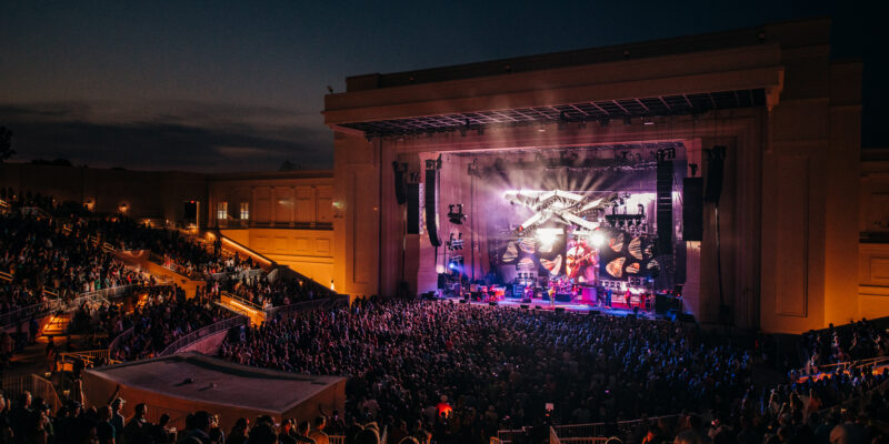 crowd shot of an amphitheater at night