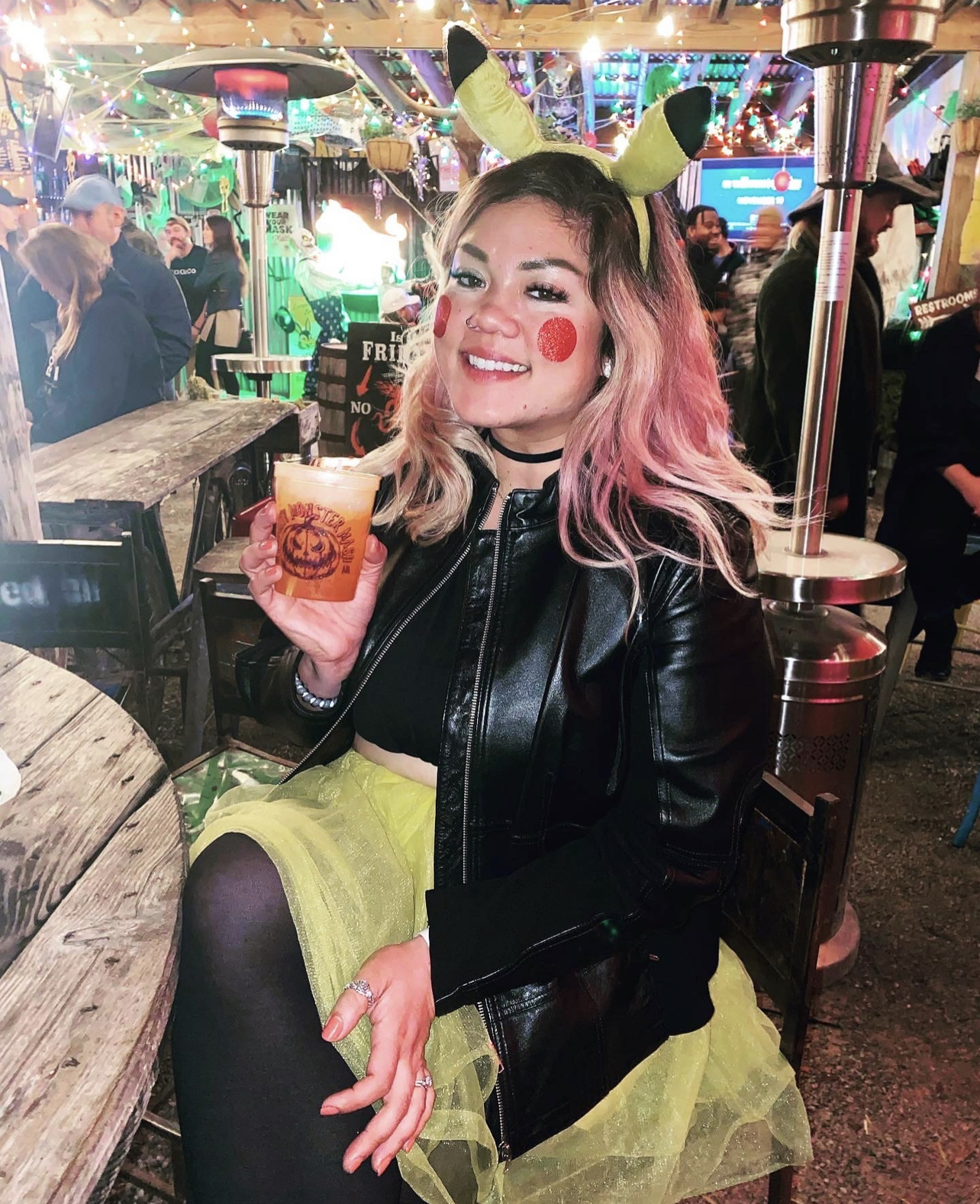 a woman dressed up as Pikachu for Halloween